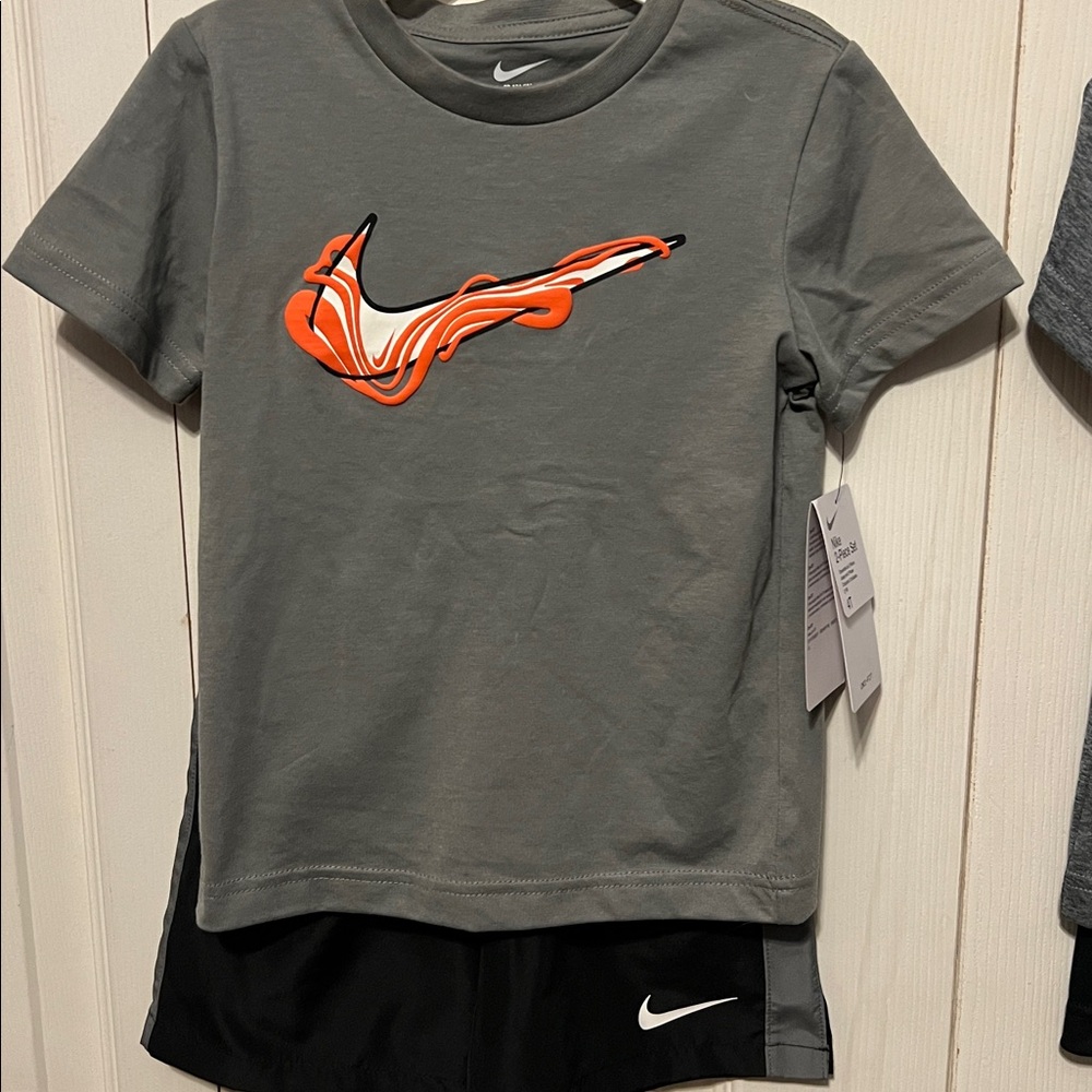 Nike Gray T-Shirt with Orange Logo and Black Shorts